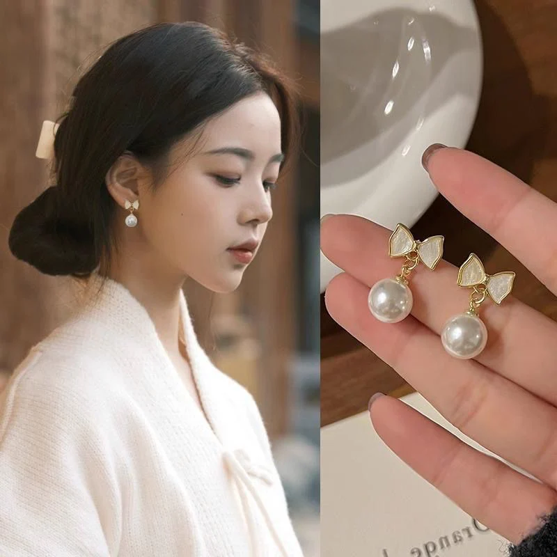 Bow Pearl Drop Earrings - Image 2
