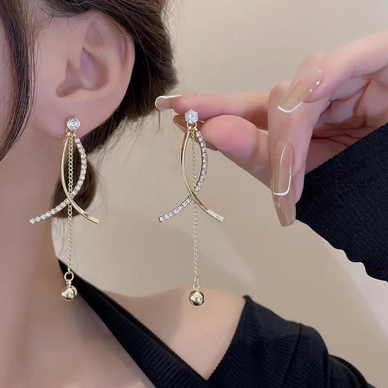 Criss cross tassel drop earrings - Image 2