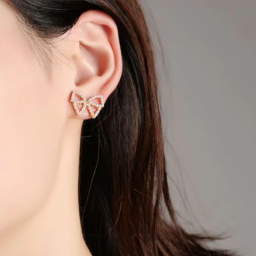Minimal Delicate Pearl Bow Earrings - Image 4