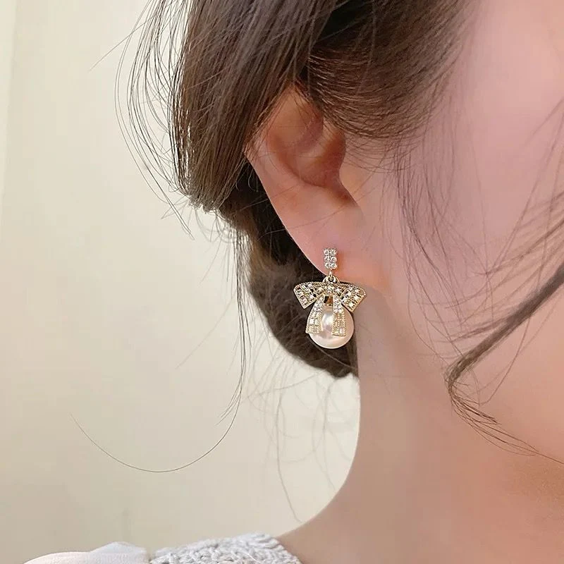 Mismatch Pearl Drop Bow Earrings - Image 3