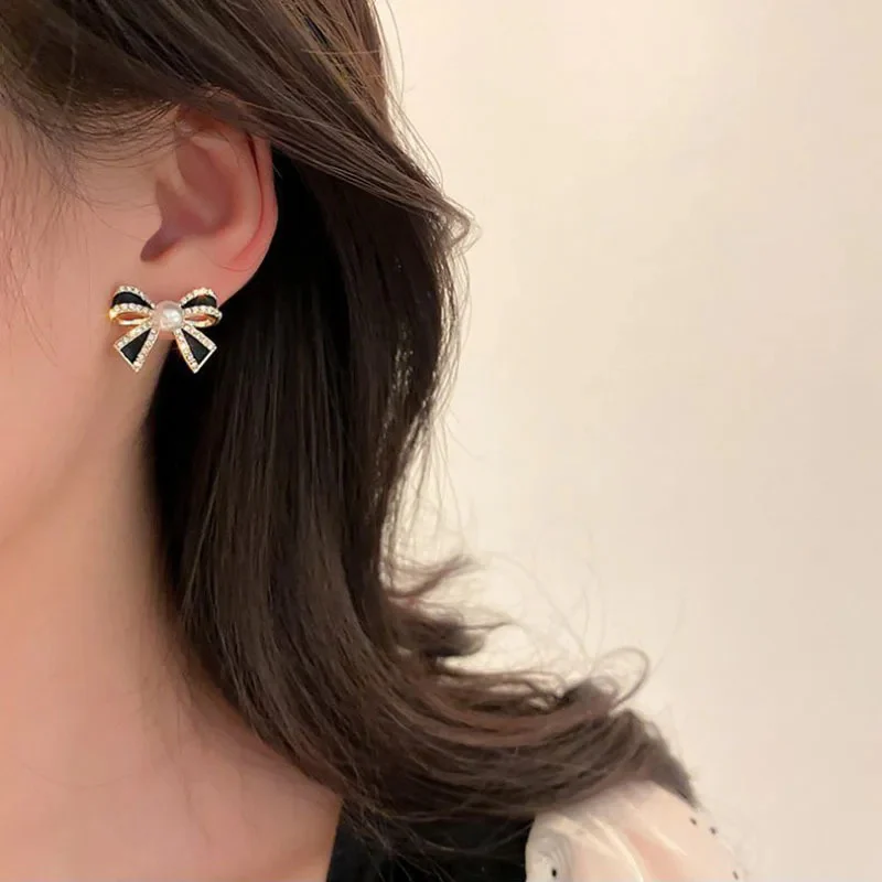 Pearl Bow Earrings - Image 2