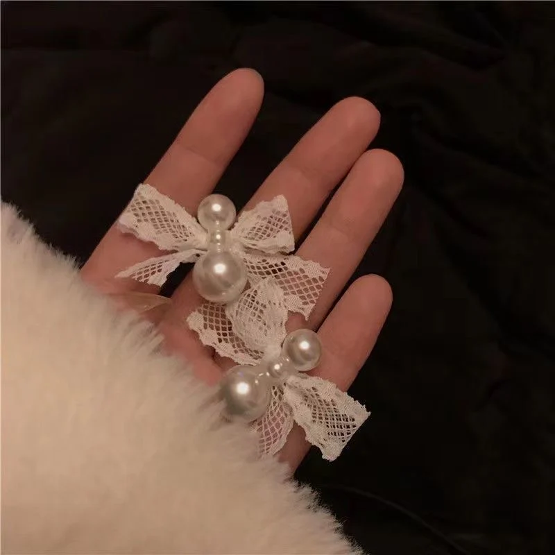 Pearly Trails Bow Earrings - Image 3