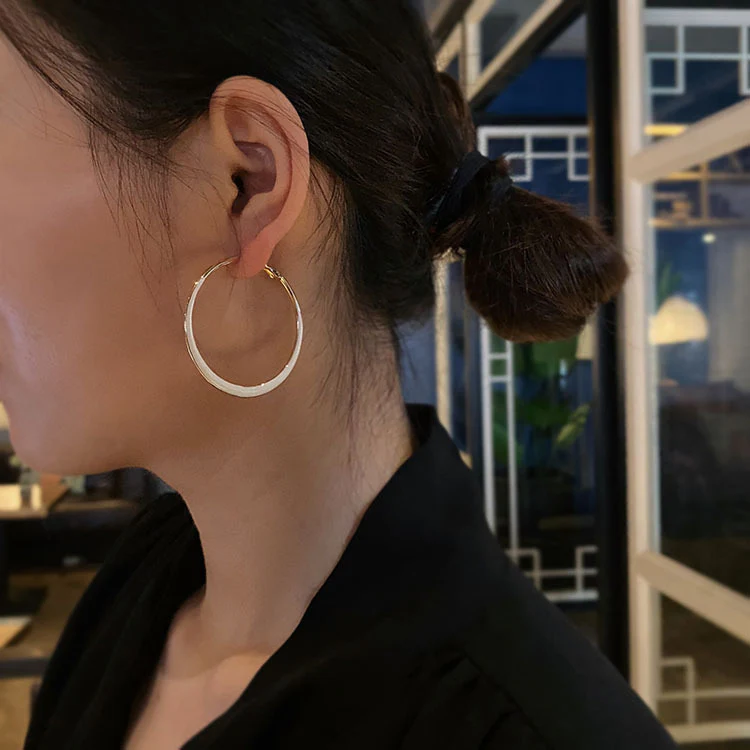 The Snow Swirl Hoop Earrings - Image 6