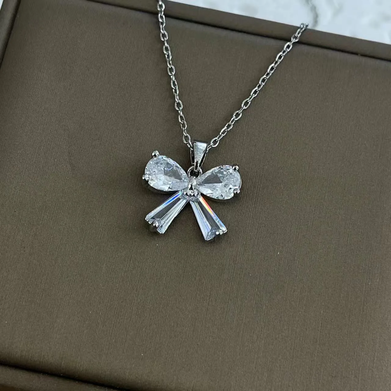Tiny Twinkle Bow Necklace