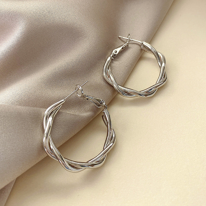 Twist of Silver Hoop Earrings - Image 4