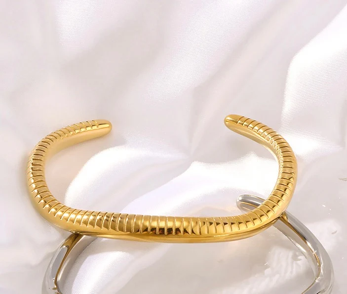 Vogue-coded Gold Bracelet